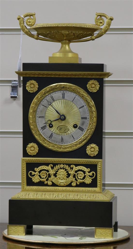 An Empire bronze and ormolu mantel clock height 39cm